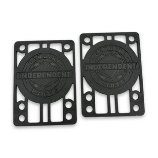 Two black Independent Genuine Parts skateboard riser pads with logo cutout design