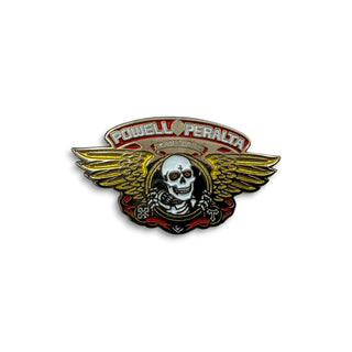 Powell Peralta winged ripper skull enamel lapel pin in red and metallic gold