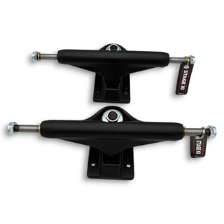 Pair of matte black Independent Stage 11 skateboard trucks with silver axles