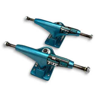 Thunder T-II skateboard trucks in metallic ice blue, pair, 149mm