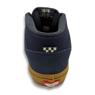 Vans Skate Half Cab sneaker heel view, navy suede upper, gum sole, checkered patch