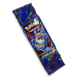 Santa Cruz x Pokémon holographic blind bag skateboard deck in iridescent blue packaging