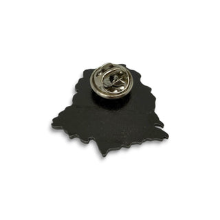 Back view of black Powell Peralta Ripper shaped lapel pin with silver butterfly clasp