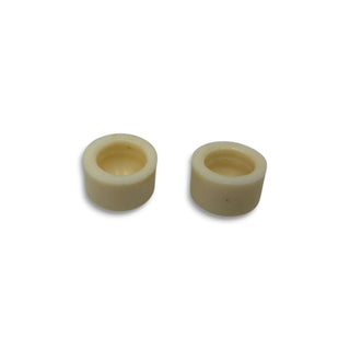 Two white cylindrical skateboard pivot cups with hollow centers, sold as a set
